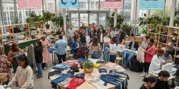 People engaging in circular fashion activities, exchanging and repairing clothes, symbolizing sustainability and community.